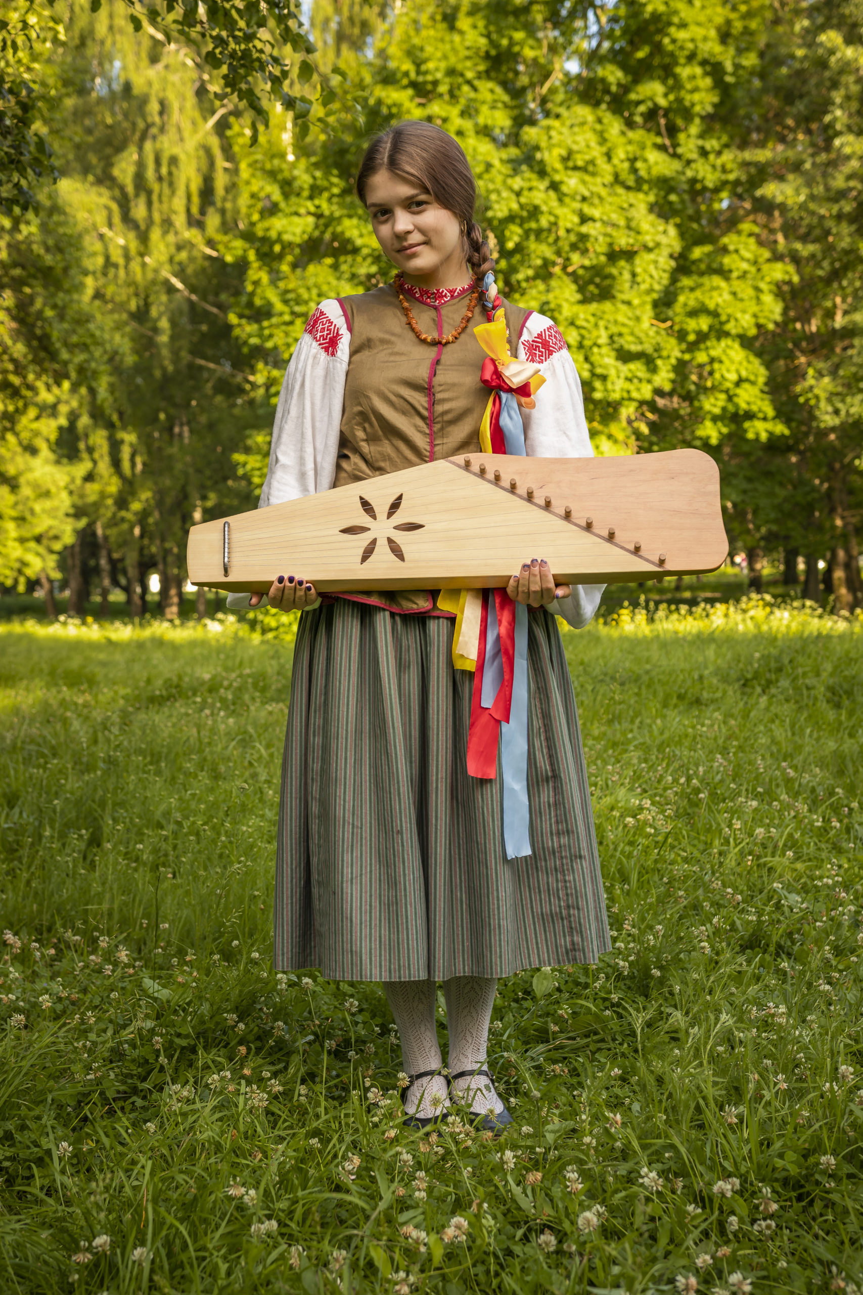 Kokle or historically kokles (kūkles) is a Latvian plucked string instrument